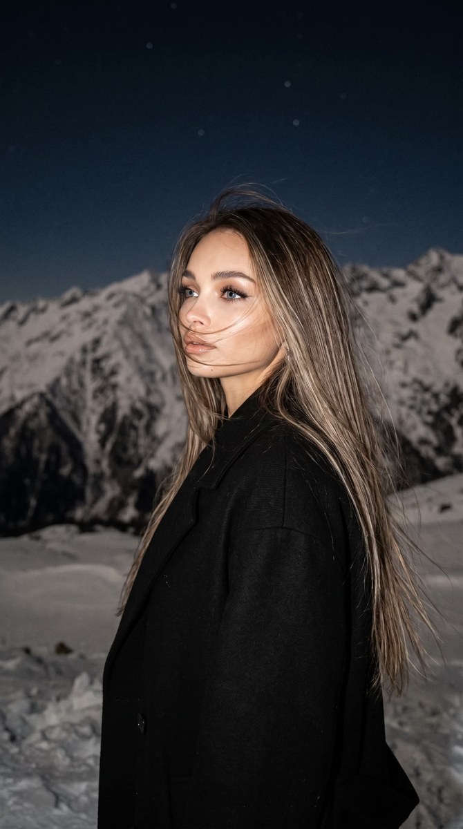 Windblown Portrait in a Snowy Mountain Landscape output 1