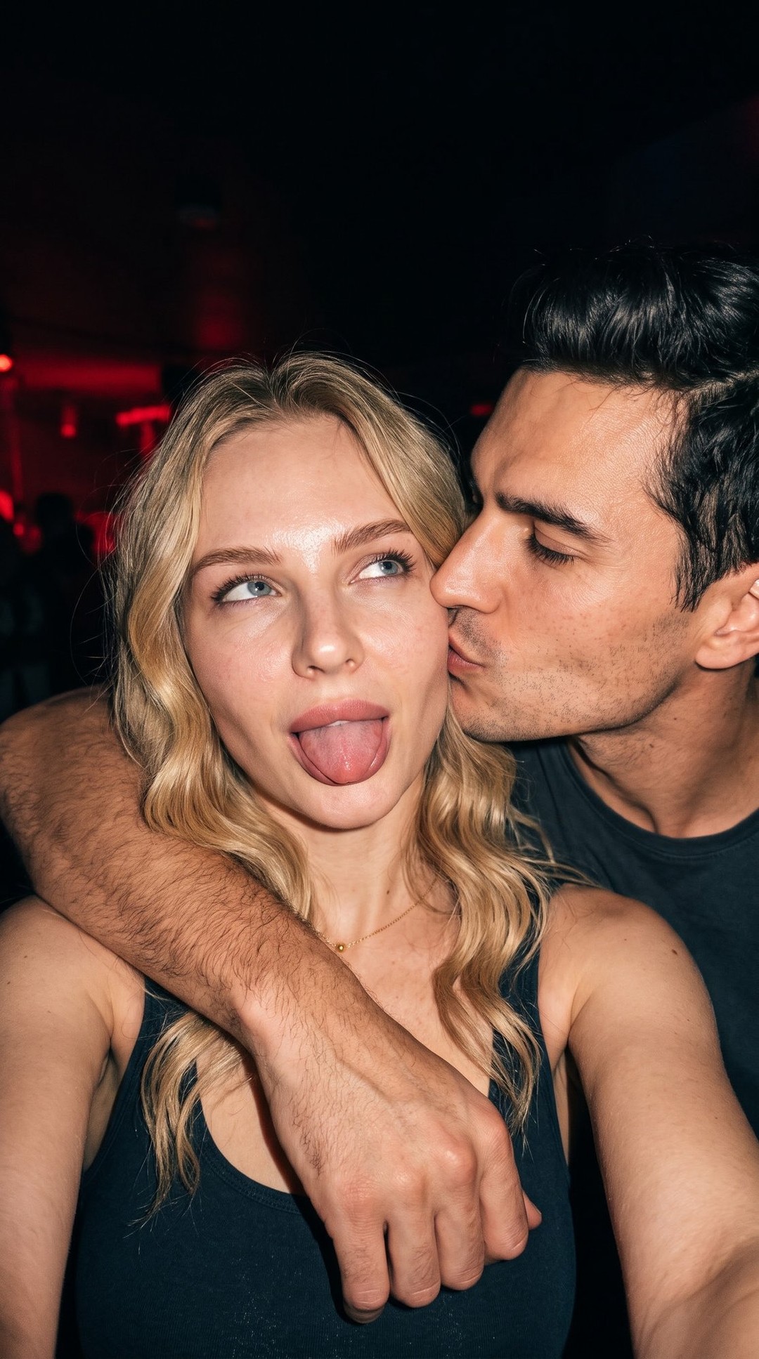 Flash-Lit Defiant Couple Selfie