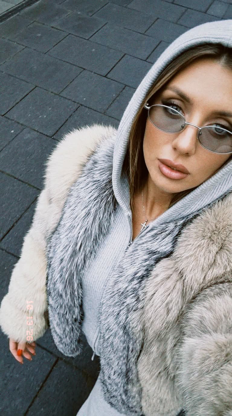 High-Angle Motion-Blurred Fur Selfie
