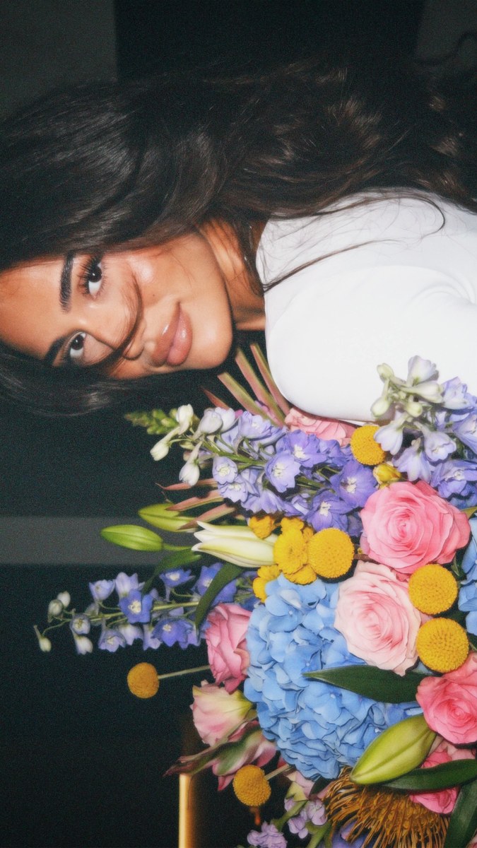 Dark, Flash-Lit Portrait with a Luxurious Colorful Bouquet output 2