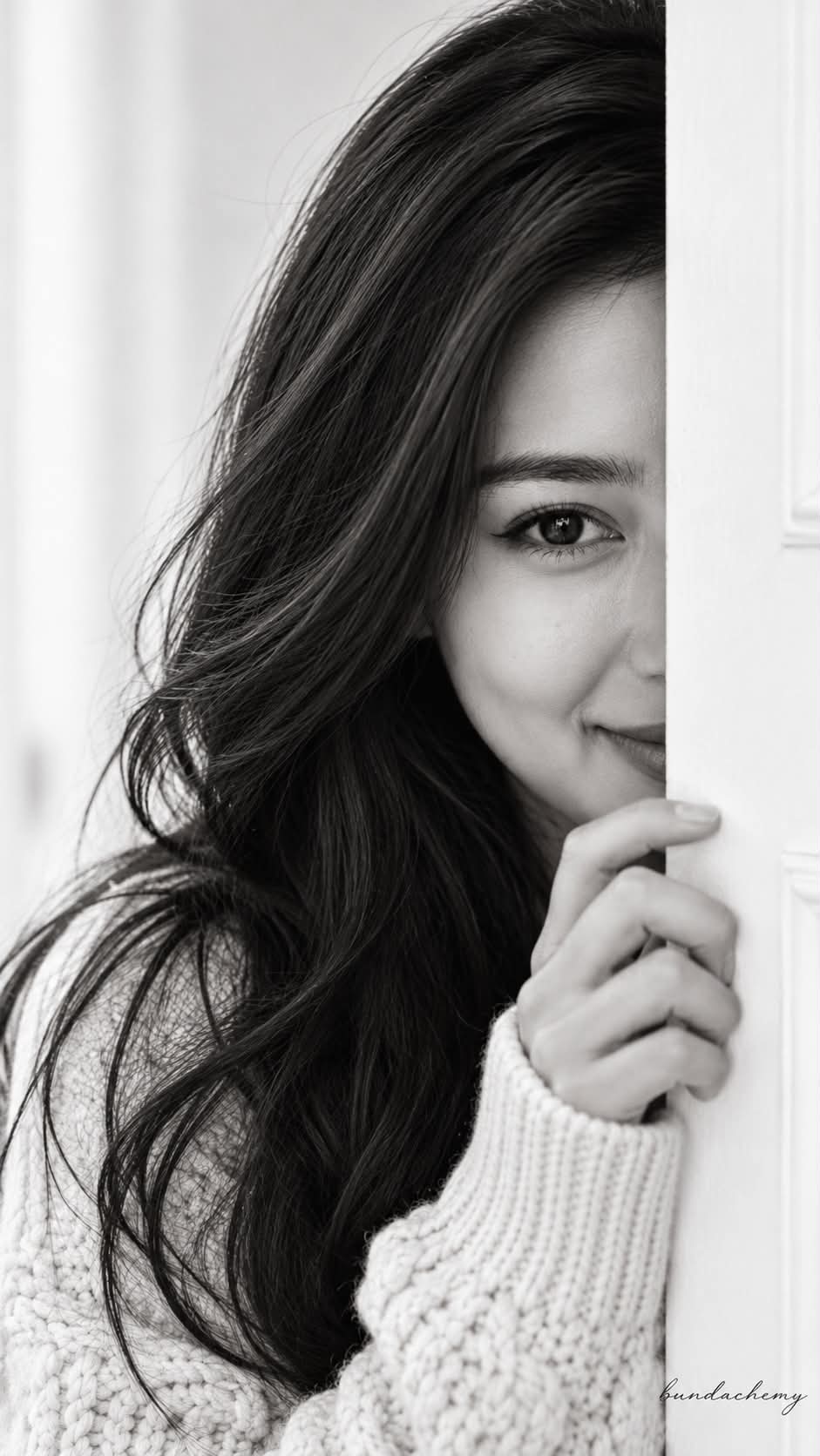 Candid Monochrome Portrait Peeking Around a Wall output 2