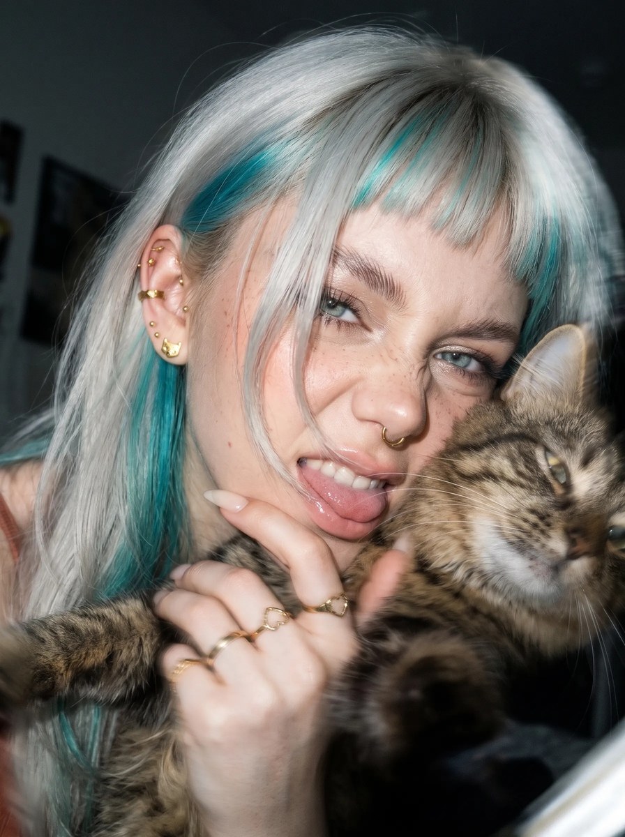 Young Woman Cuddling a Tabby Cat output 14
