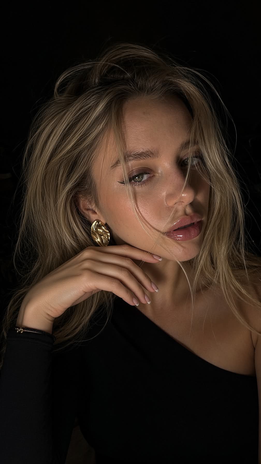 Photorealistic Close-Up Portrait in Deep Shadow output 2