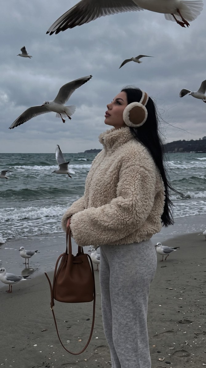 Candid Seaside Portrait with Flying Seagulls