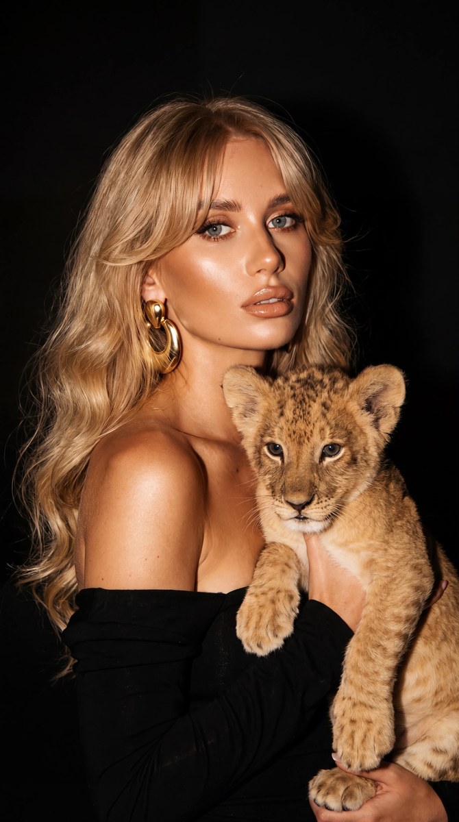 Luxury Flash Fashion Portrait with a Lion Cub