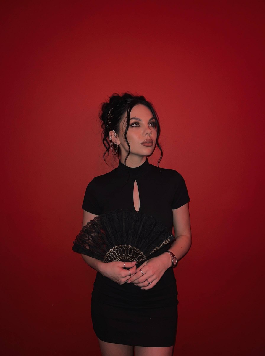 Casual Red-Lit Smartphone Portrait