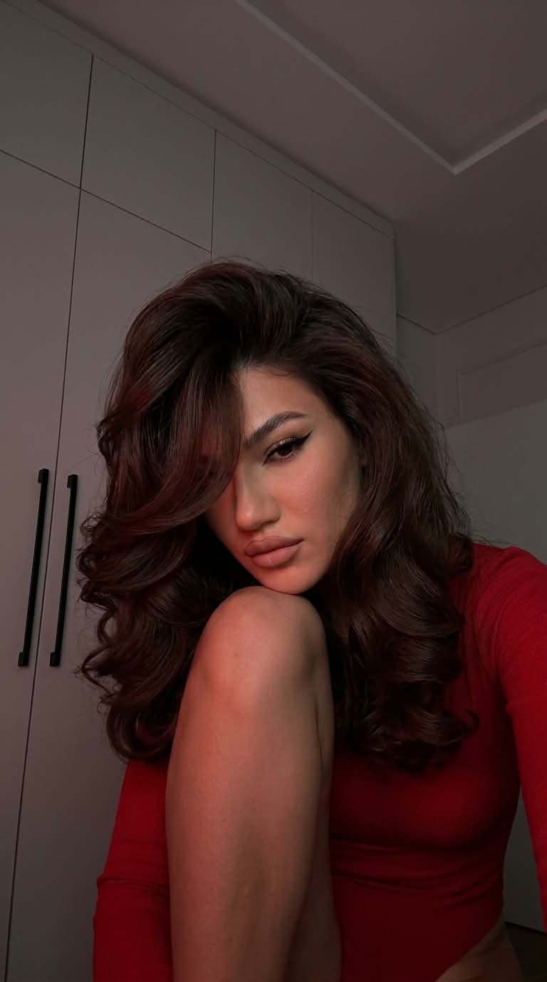 Low-Light Red-Lit Selfie with a Voluminous Blowout output 2