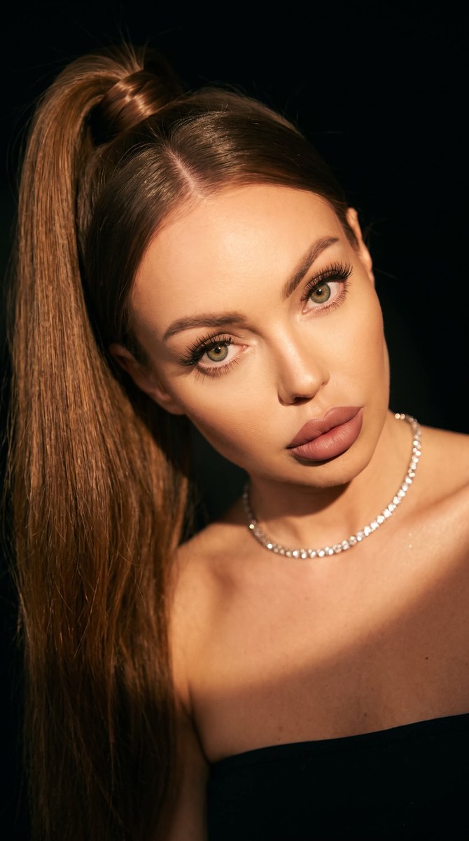 Cinematic Close-Up Portrait with Warm Split Lighting output 1