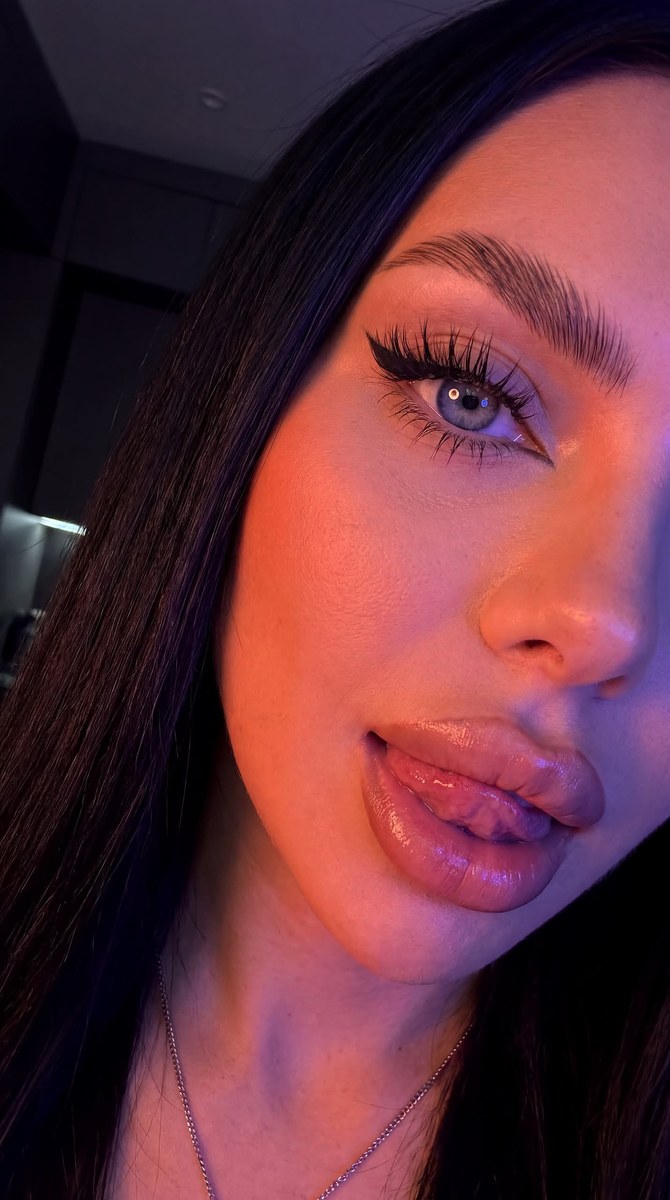 Extreme Close-Up Photorealistic Selfie output 2
