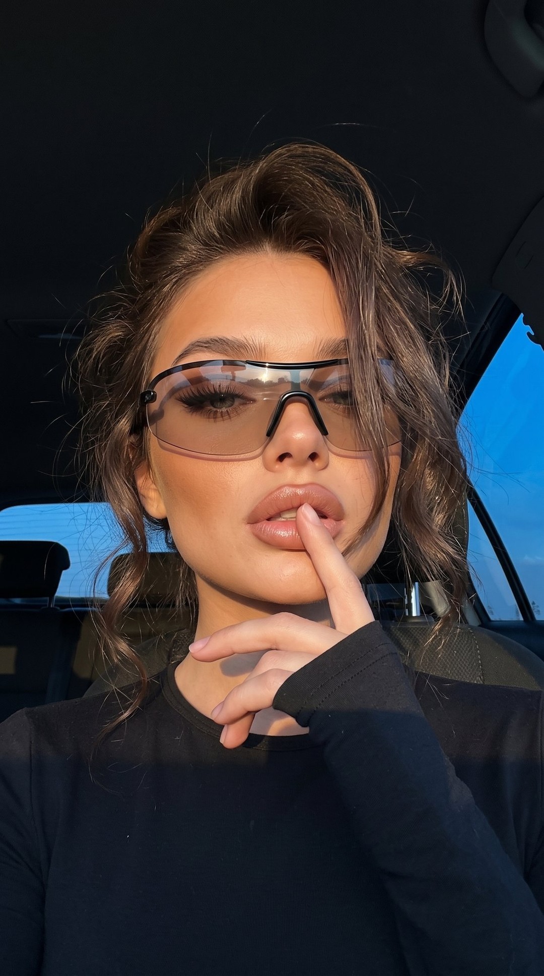 Photorealistic Car Selfie of a Young Woman output 1