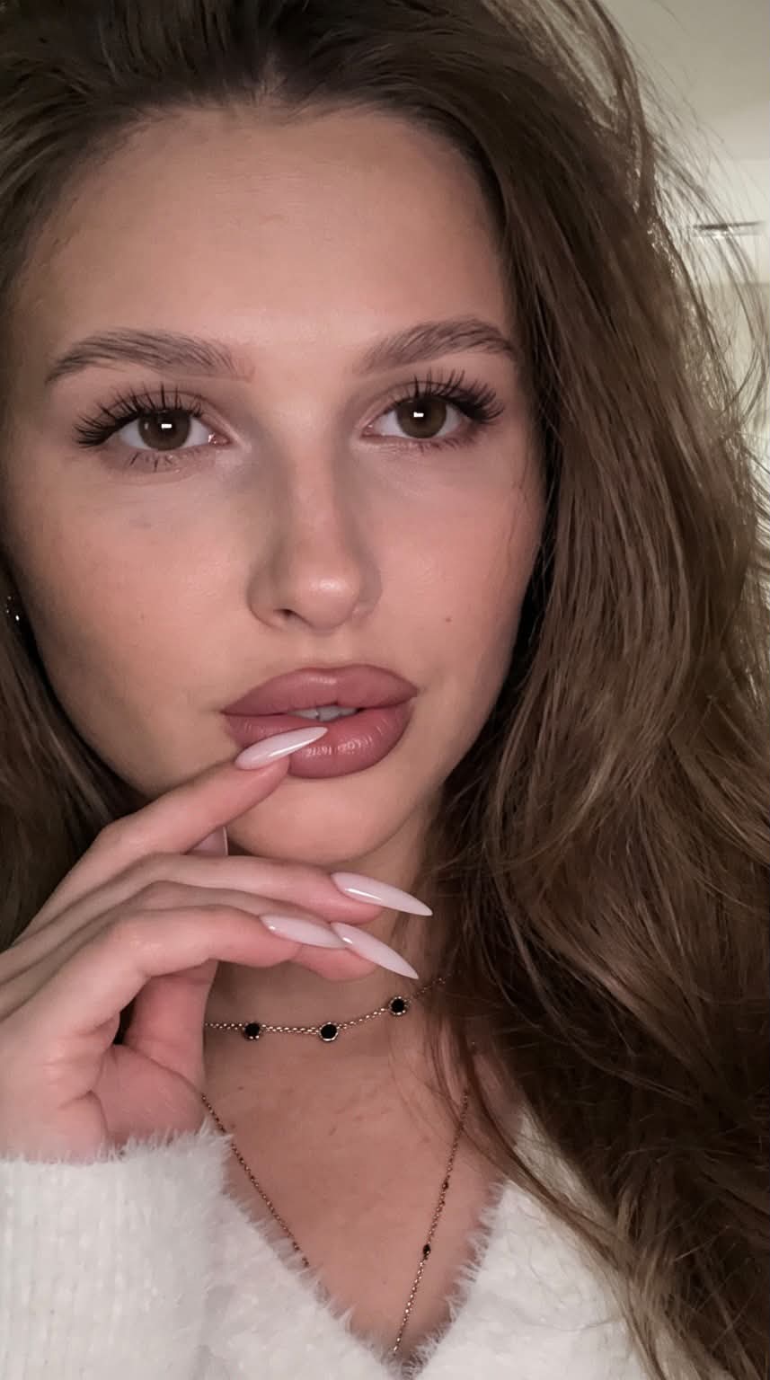 Close-Up Selfie with Voluminous Long Hair output 2