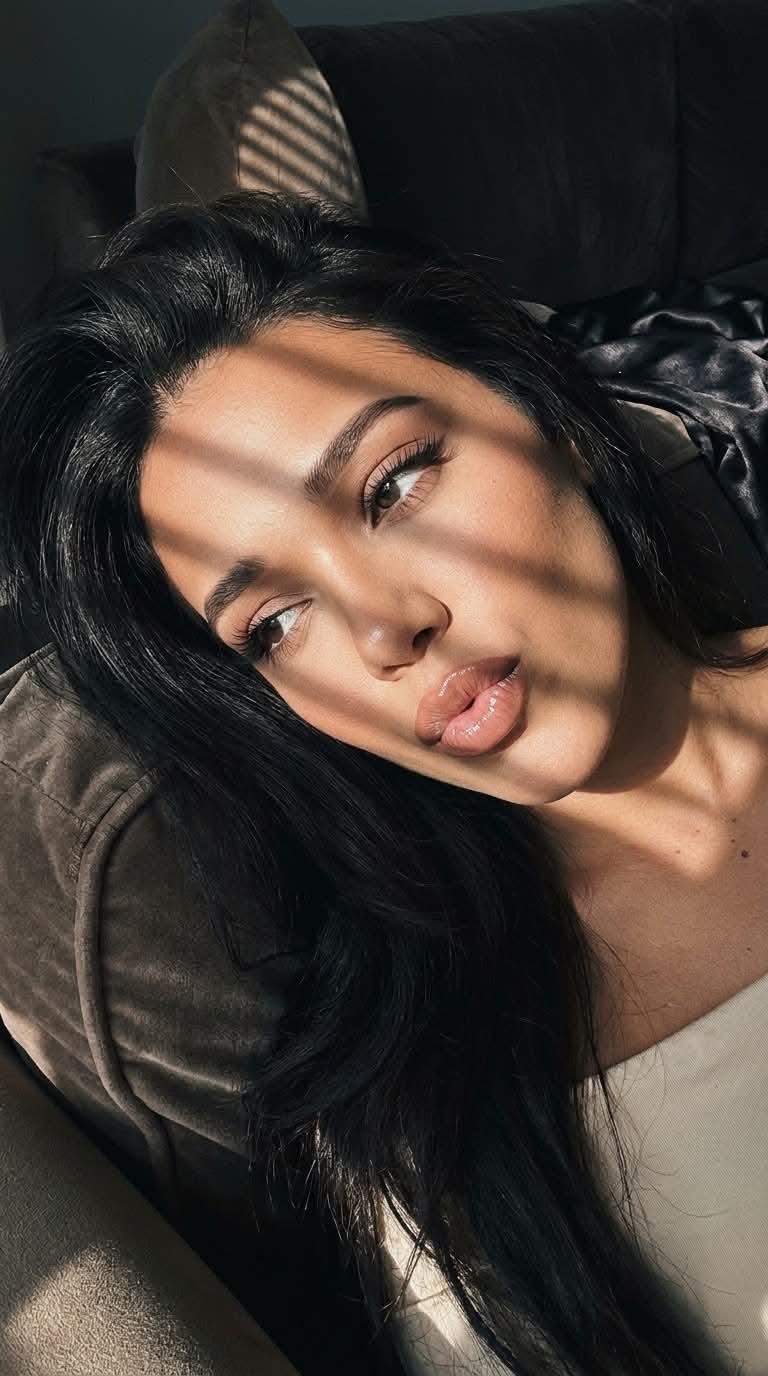 Warm Sunlight Macro Selfie on a Velvet Sofa