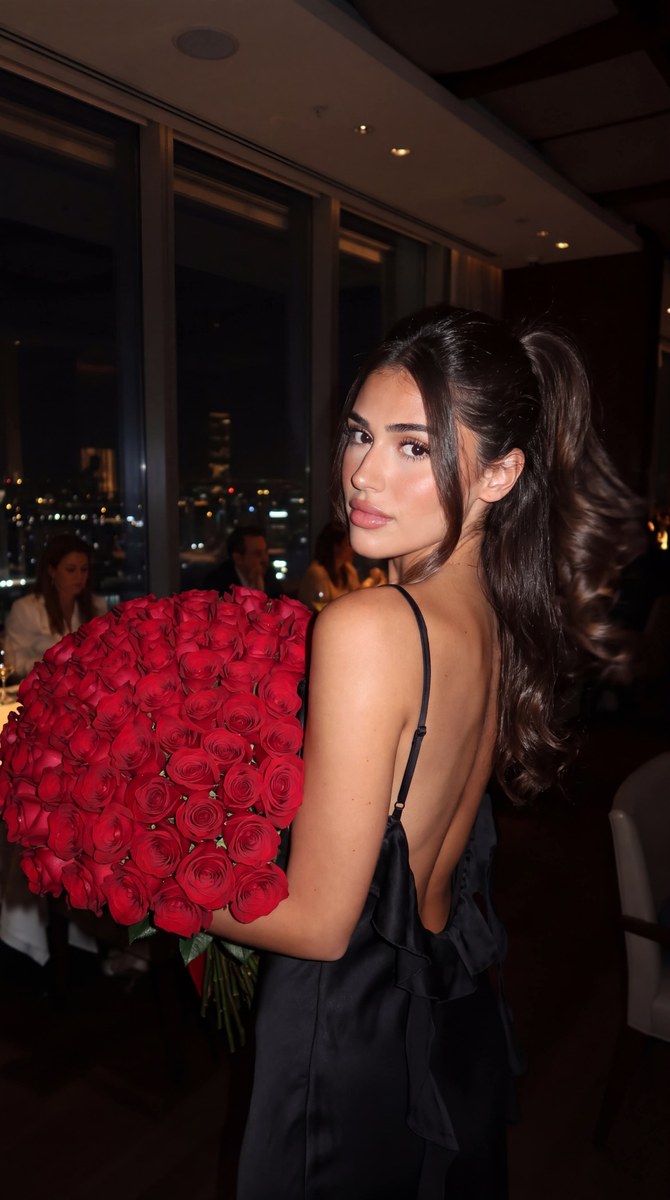 Over-the-Shoulder Portrait with Red Roses