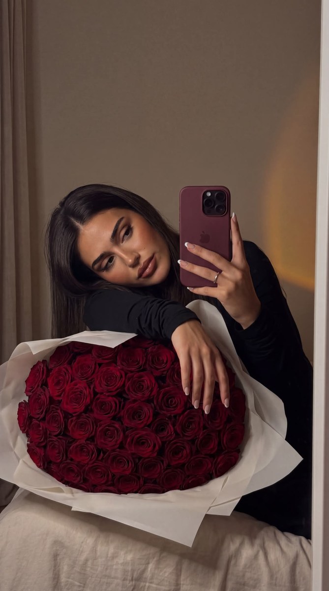 Photorealistic Evening Mirror Selfie with Red Roses output 1