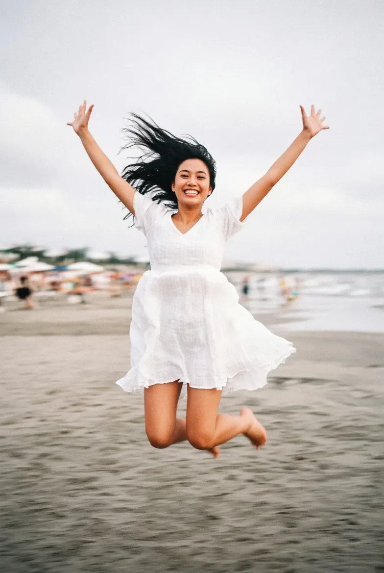Joyful Beach Jump with a Candid Film Look output 3