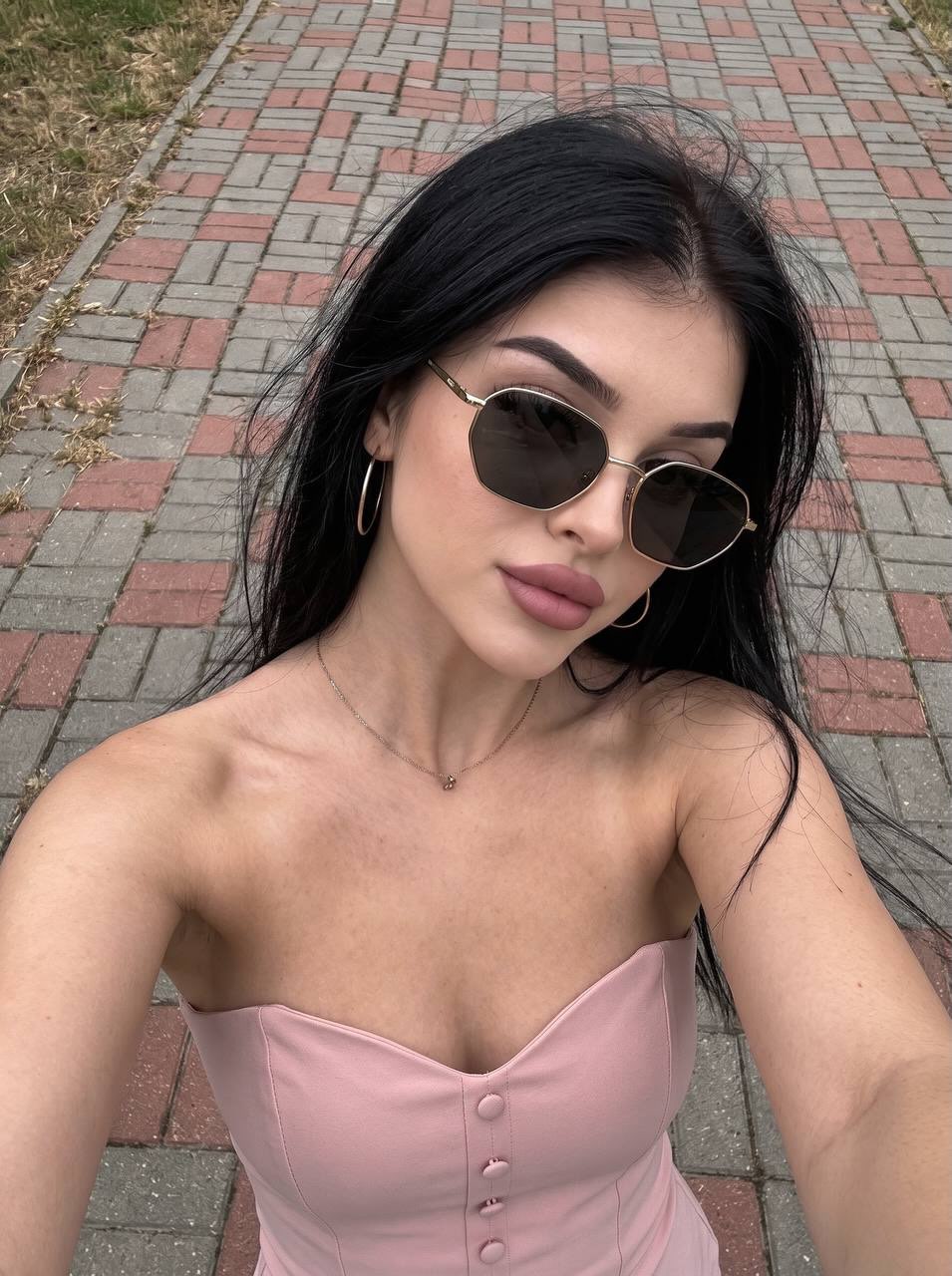 Overhead Smartphone Selfie of a Young Woman