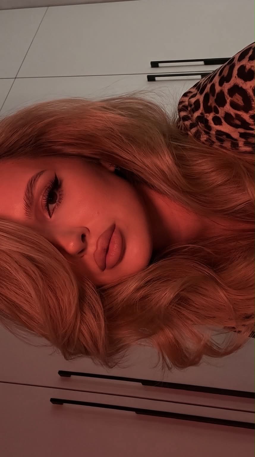 Dark Red-Lit Selfie with Voluminous Hair output 2