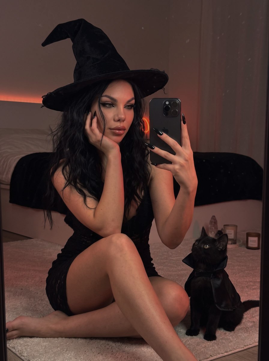 Witch-Inspired Mirror Selfie with a Black Kitten