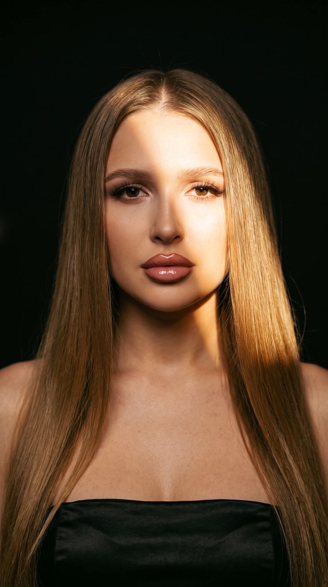 Cinematic Close-Up Portrait of a Young Woman output 2