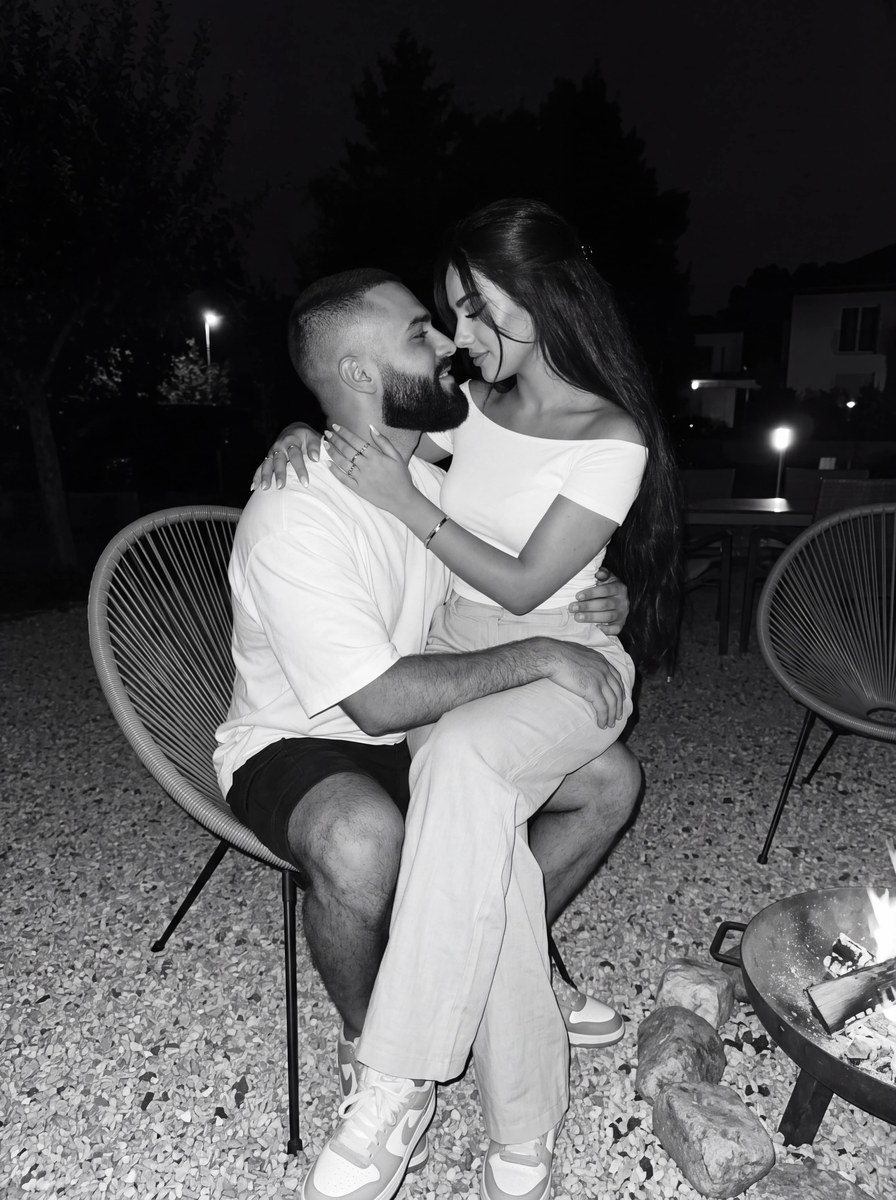 Midnight Black-and-White Couple Portrait by a Fire output 1