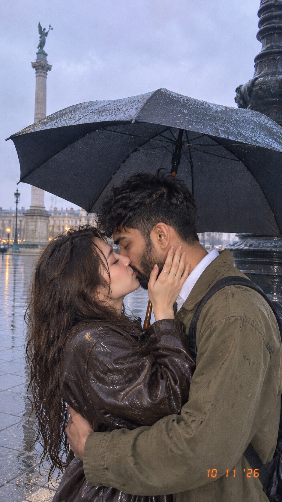 Couple Kissing Under an Umbrella in a Rain-Soaked Square