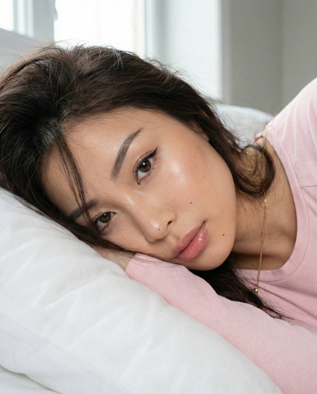 Realistic Close-Up Portrait on a White Pillow