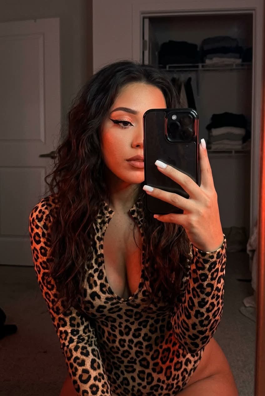Dark Leopard-Print Mirror Selfie Portrait output 1