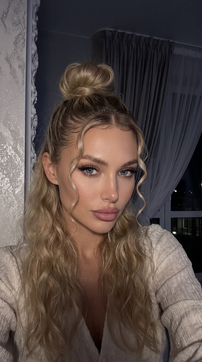 Low-Light Front-Camera Selfie with a High Bun