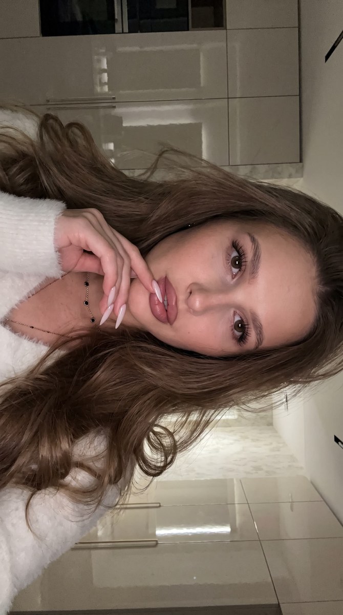 Close-Up Selfie with Voluminous Long Hair output 1