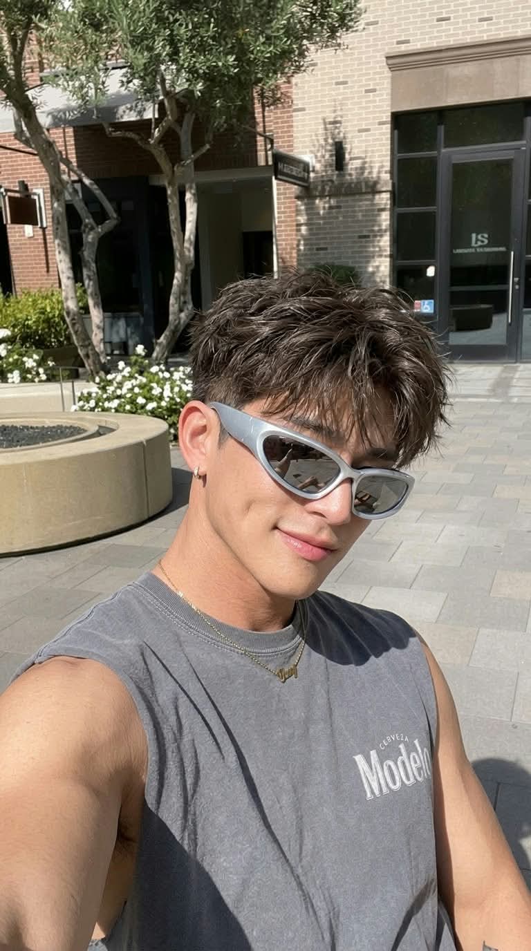 Sunny Outdoor Selfie of a Young Korean Man