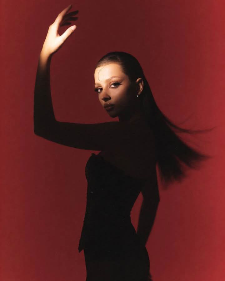 Cinematic Red-Backdrop Fashion Portrait