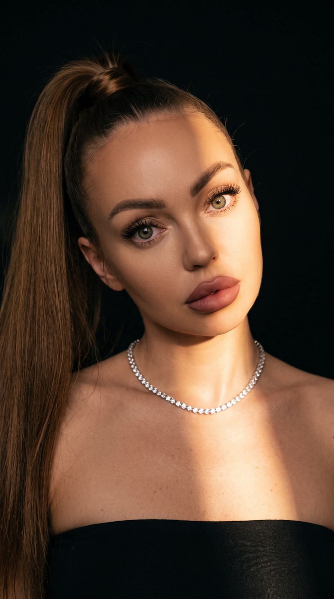 Cinematic Close-Up Portrait with Warm Split Lighting output 2