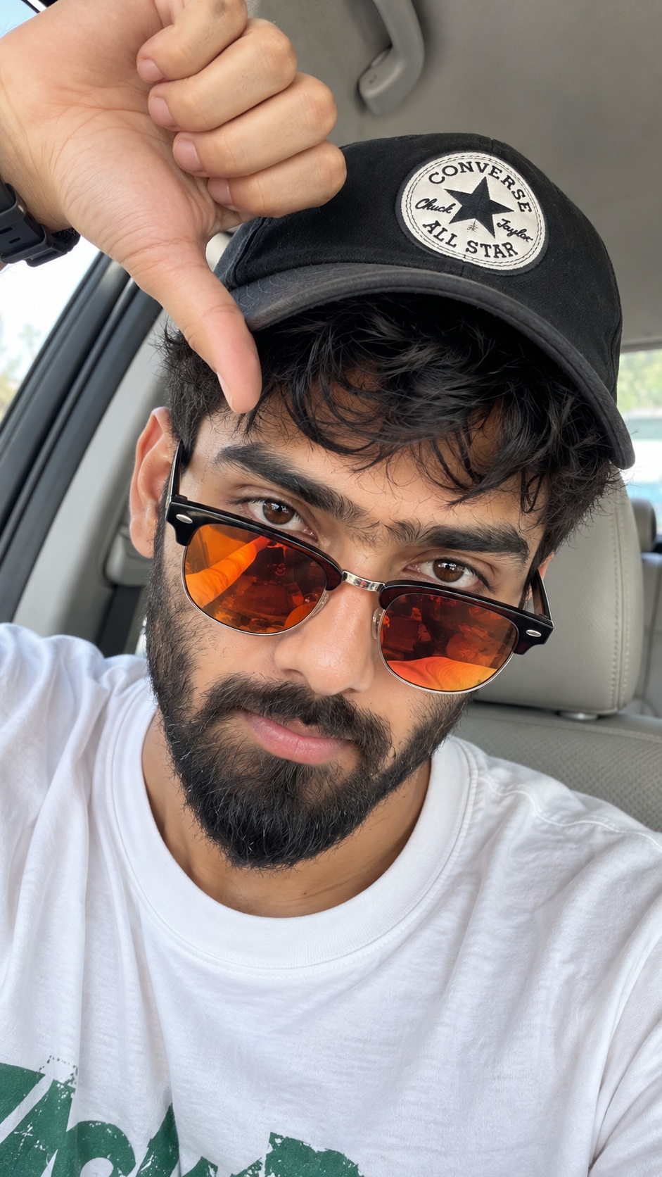 Candid Car Selfie with a Converse Cap