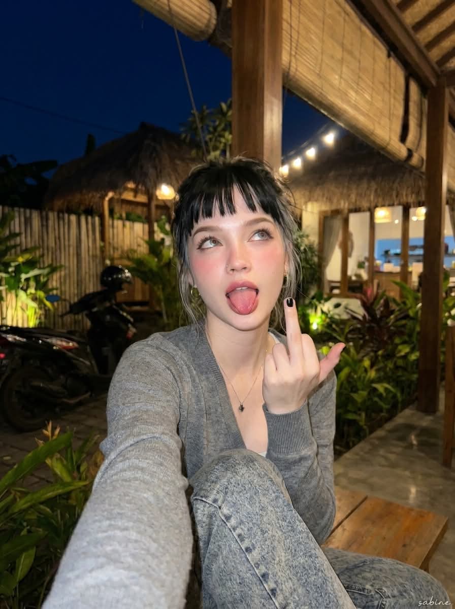 Candid Nighttime Portrait at a Rustic Tropical Café output 2