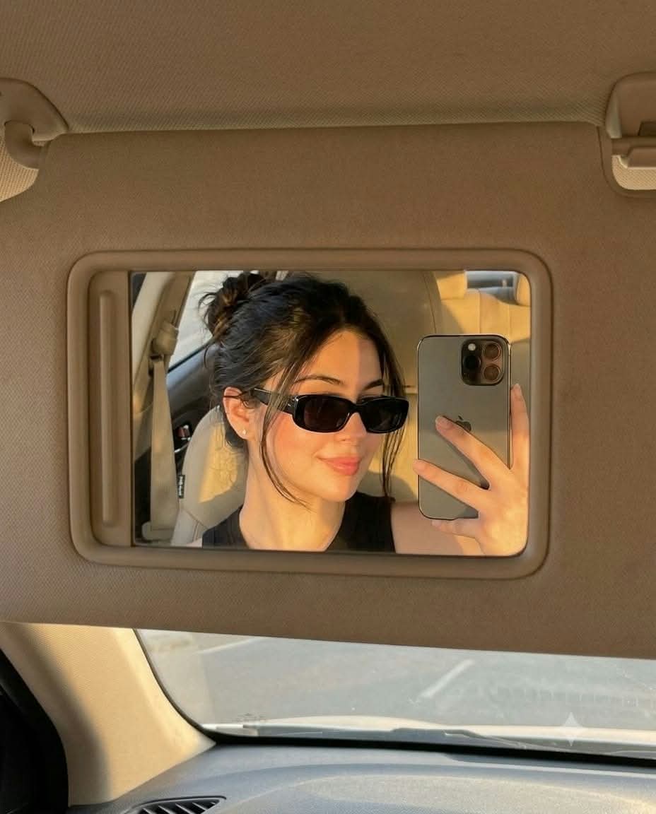Golden-Hour Car Visor Mirror Selfie