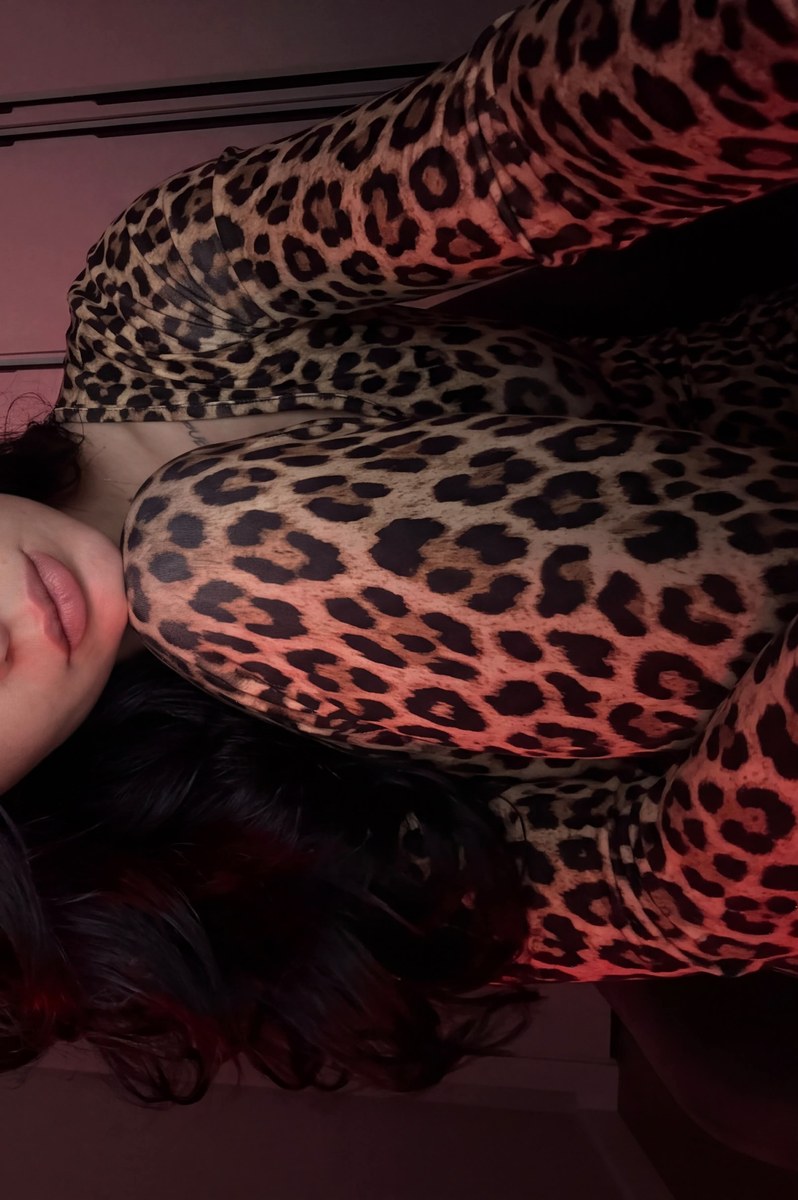 Red-Lit Leopard-Print Selfie Portrait output 2