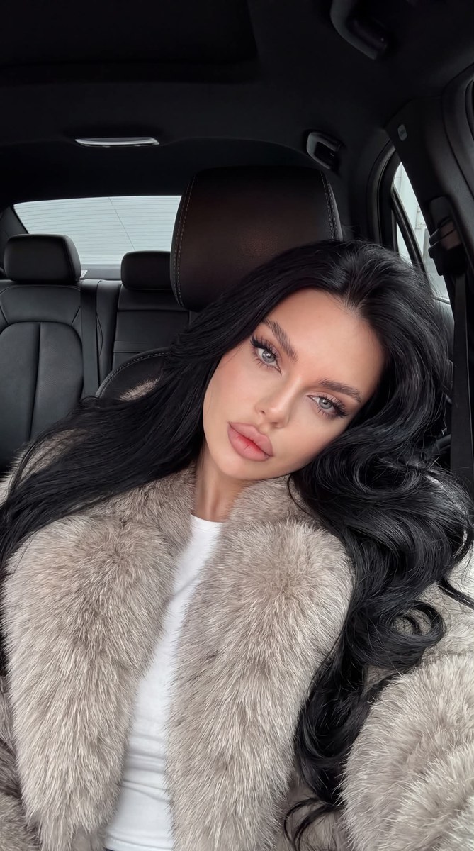 Low-Angle Fur-Coat Car Selfie output 1