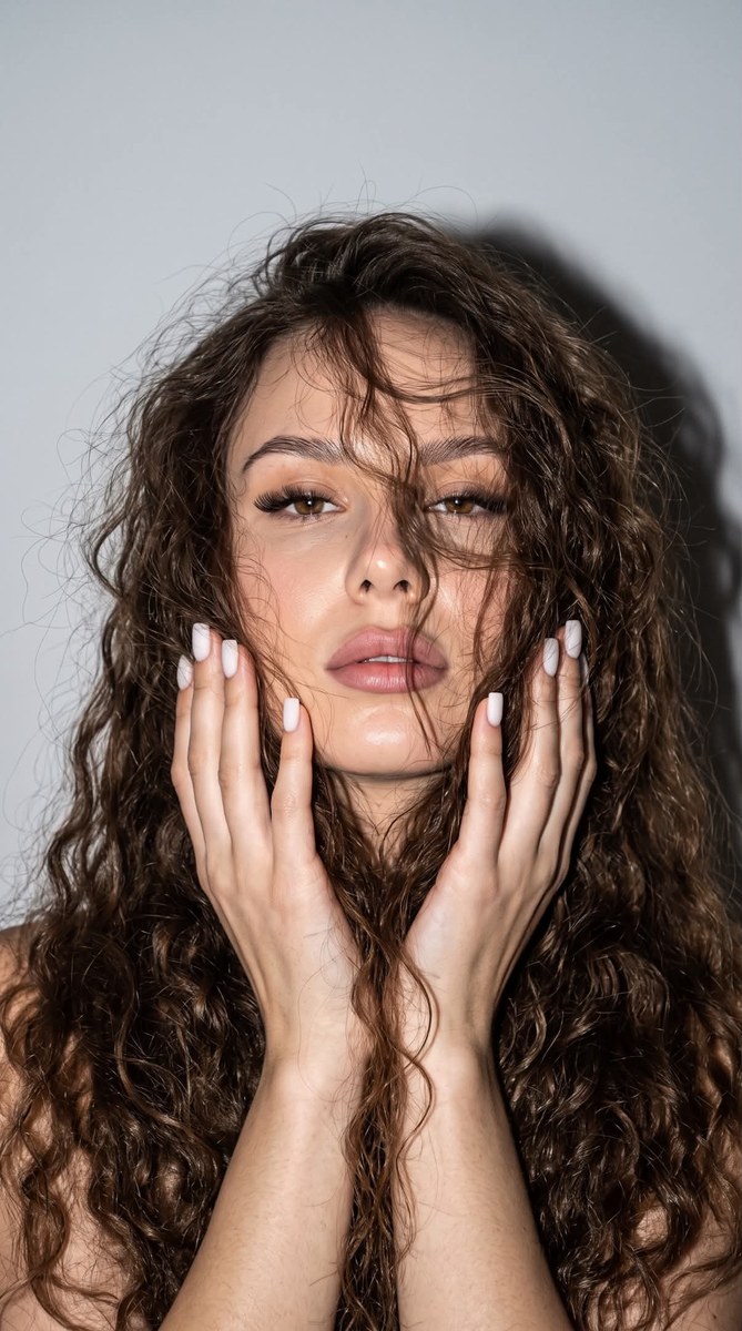 Hard-Flash Portrait with Tousled Curly Hair