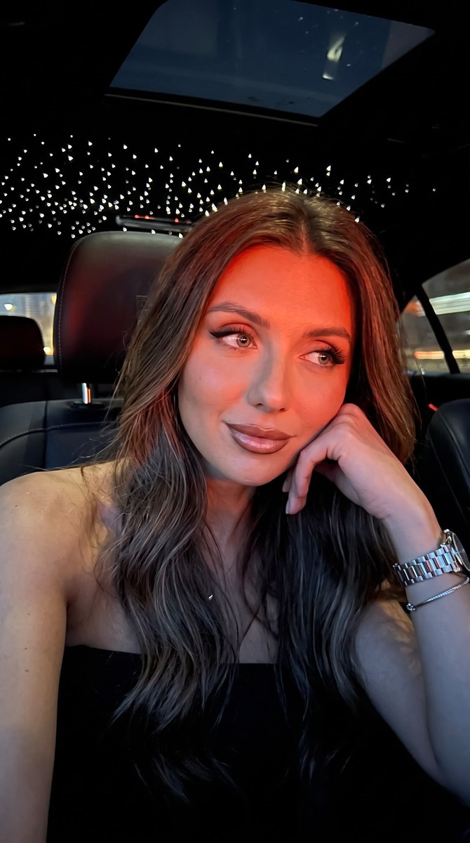 Blurry Nighttime Portrait in a Luxury Car output 1