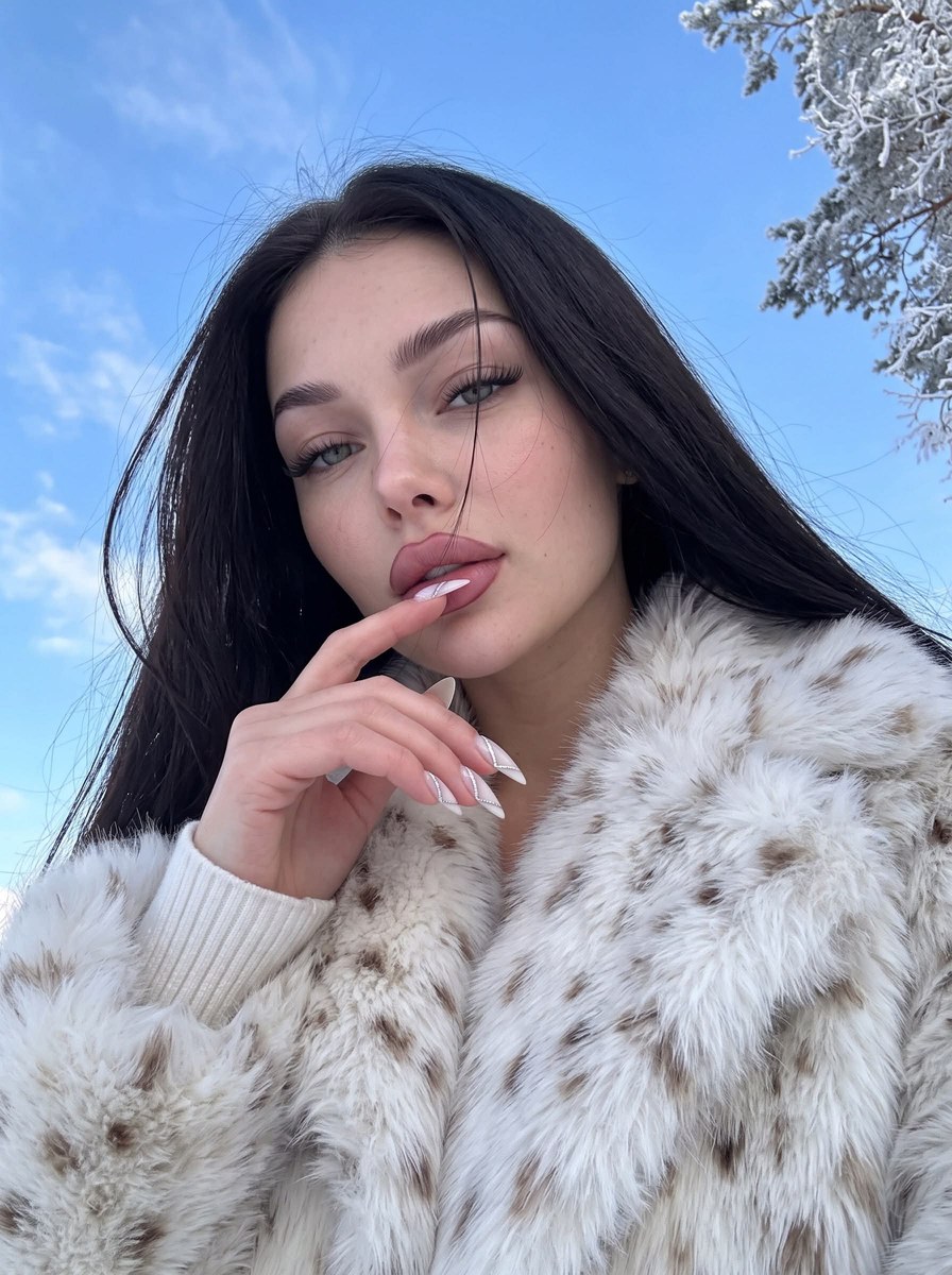 Snowy-Sky Low-Angle Selfie