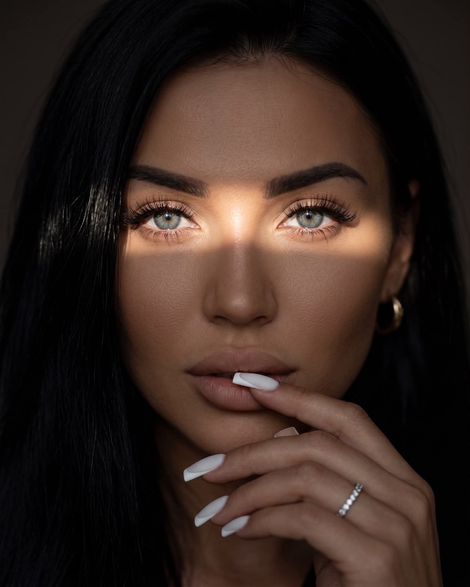 Cinematic Close-Up Portrait in Dramatic Light