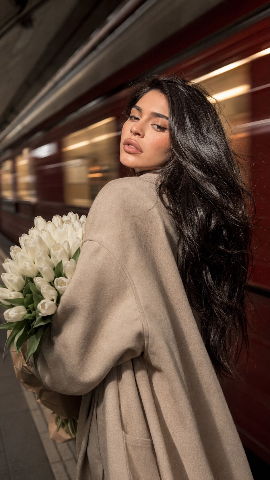 Cinematic Metro Fashion Portrait with White Tulips