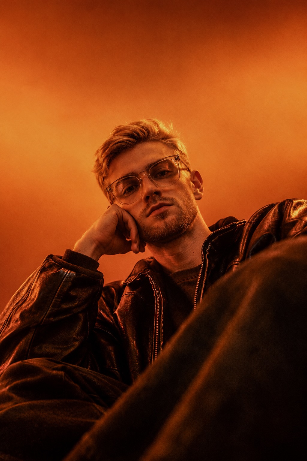 Orange-Lit Low-Angle Fashion Portrait