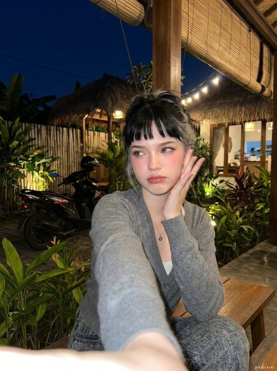 Candid Nighttime Portrait at a Rustic Tropical Café output 10