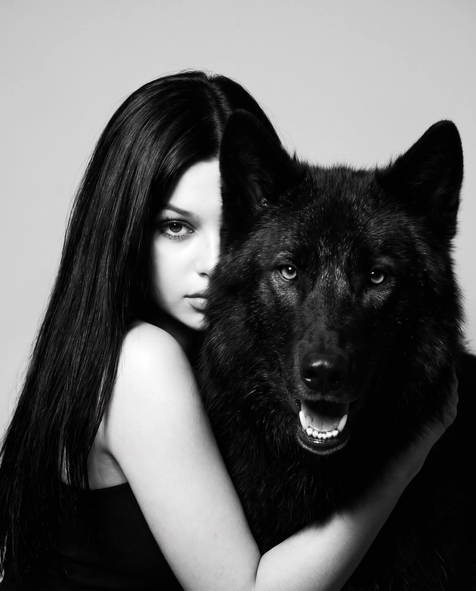 Gothic Black-and-White Portrait with a Wolf