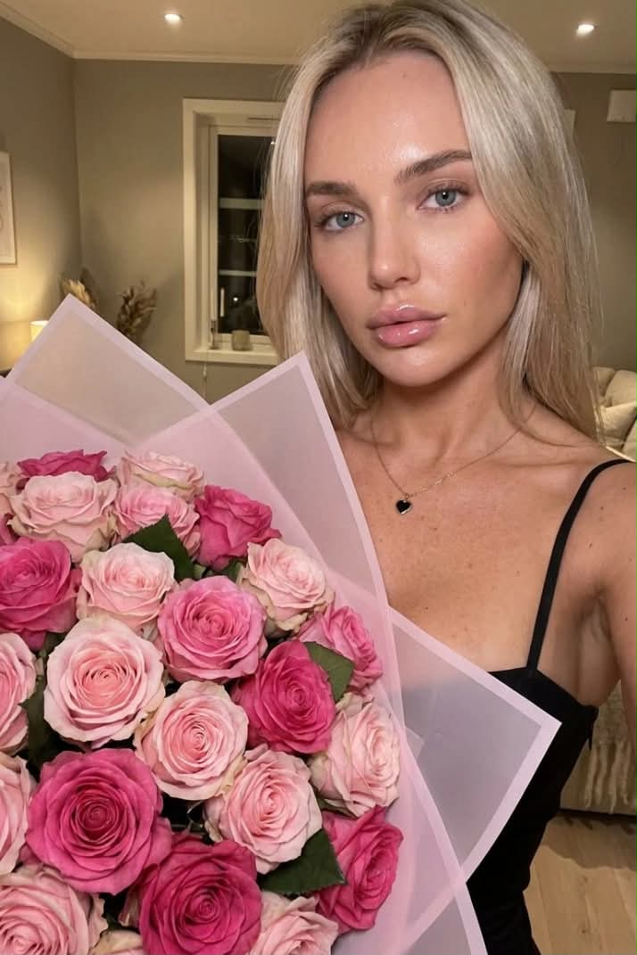 Smartphone Selfie with a Large Pink Rose Bouquet