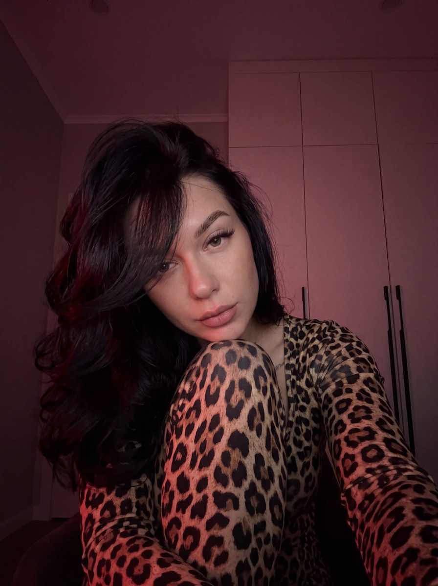 Red-Lit Leopard-Print Selfie Portrait output 1