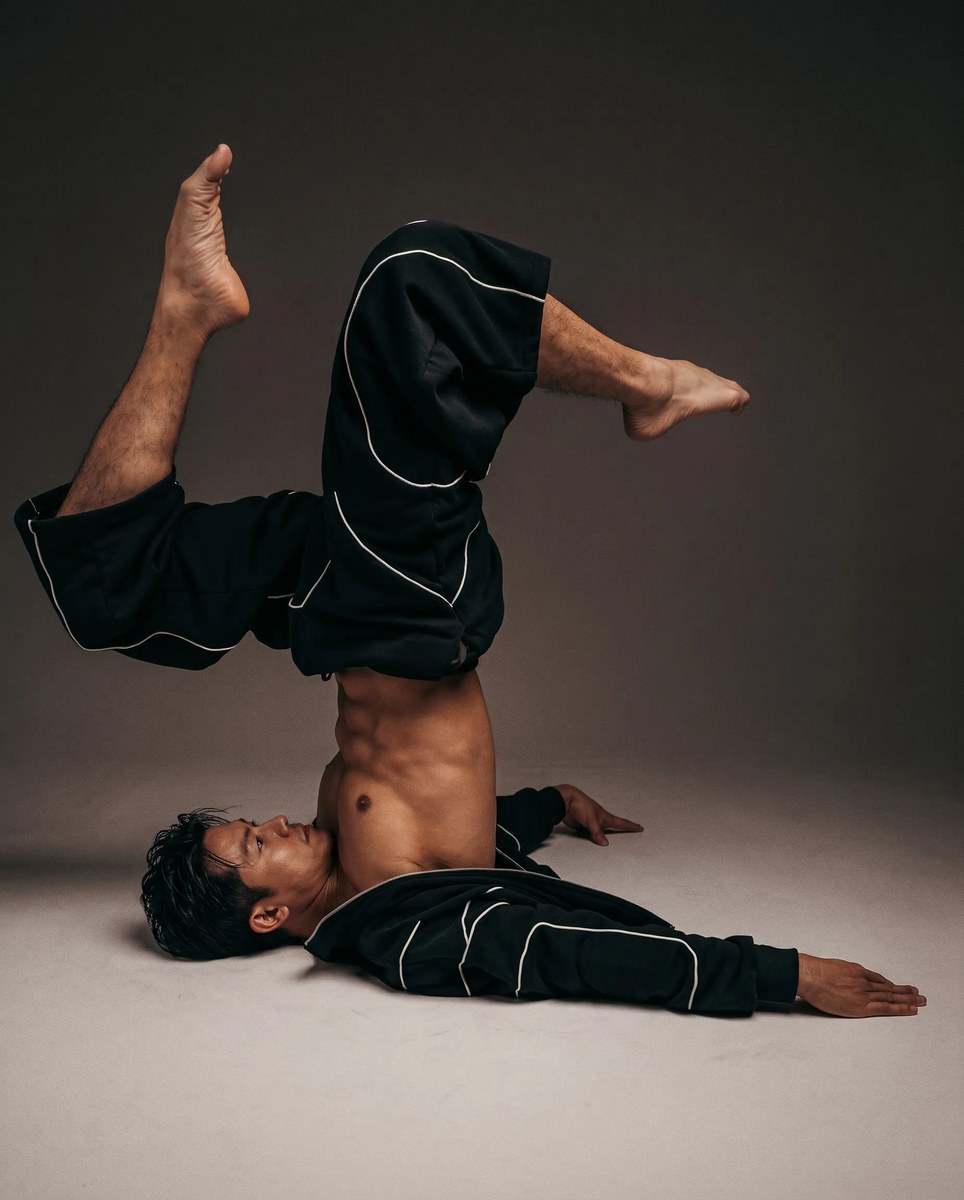Cinematic Athletic Inverted-Pose Fashion Portrait