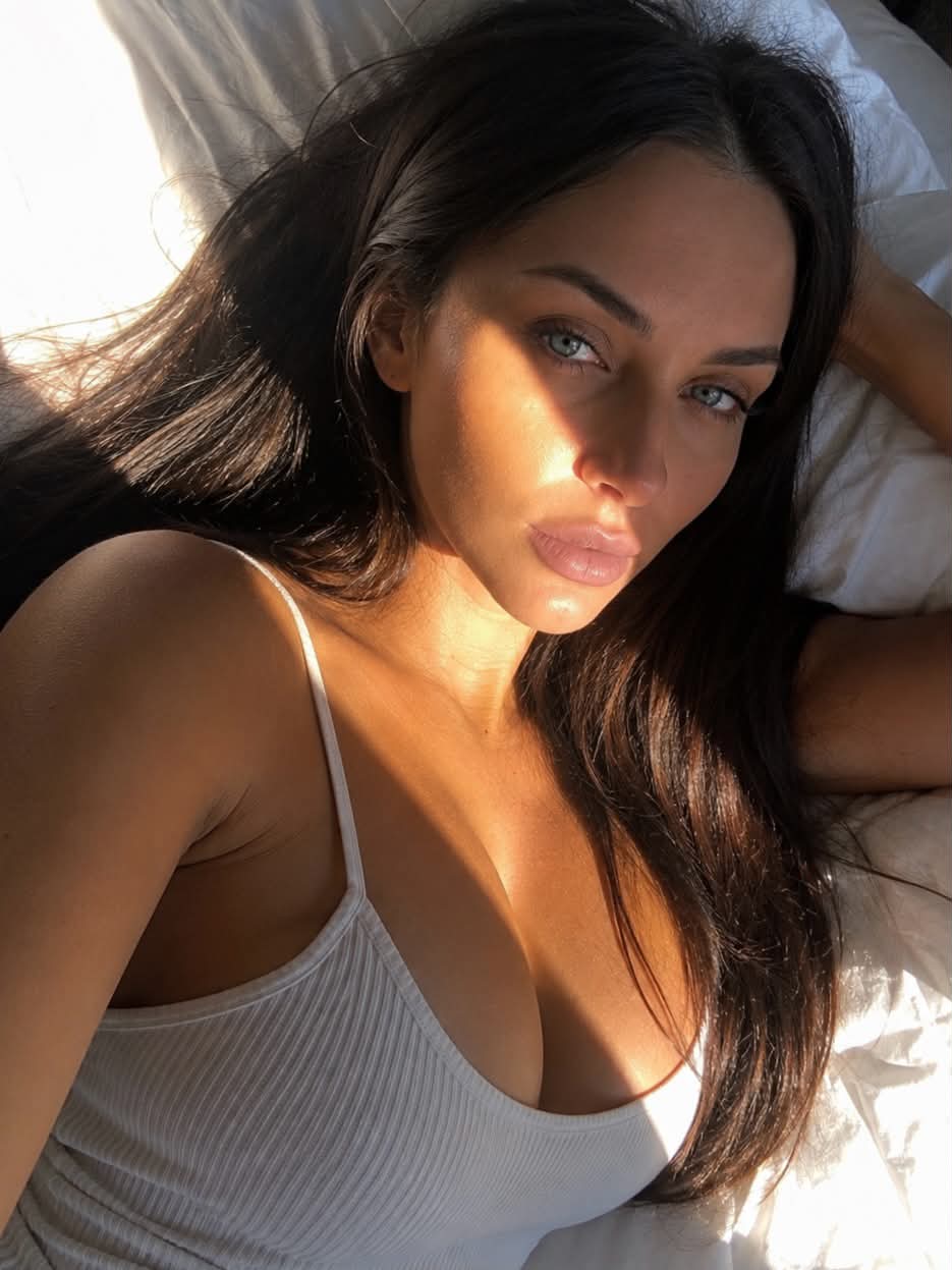 Warm Morning Light: Candid Hotel-Bed Portrait