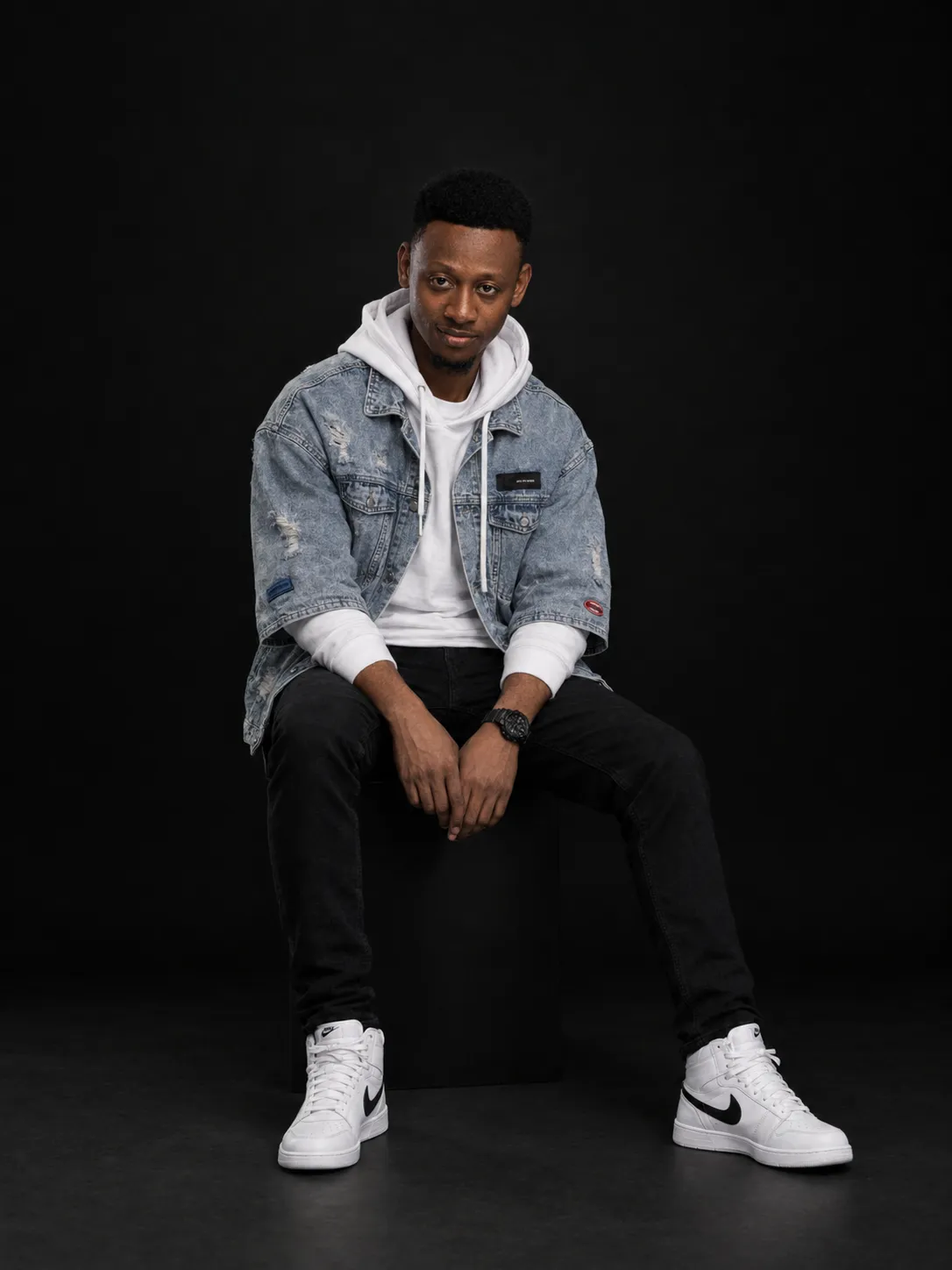 Moody Black-Backdrop Streetwear Editorial Portrait output 1